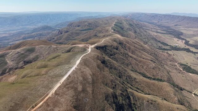 Aerial view of Caminho do C&eacute;u, a scenic road that follows the mountain ridge in the region of Delfin&oacute;polis, in Serra da Canastra, Minas Gerais, Brazil