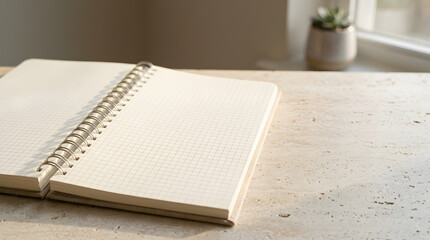 Fototapeta premium Open notebook on rustic wooden desk with natural light