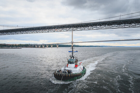 Passenger Ship Leaving Port of Rosyth and Sailing Beneath the Iconic Firth of Forth Bridges, Scotland, August 2026