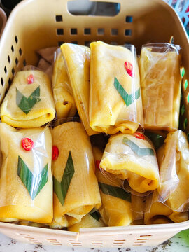 Indonesian Dadar Gulung Crepes in a Basket