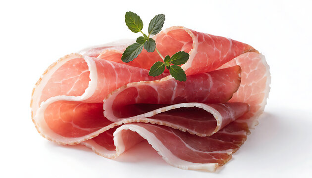 Thinly sliced prosciutto ham with fresh mint garnish isolated on white background