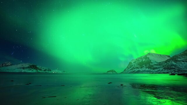Strong bright Aurora Borealis snow covered lava field mountains, Breathtaking View Of Aurora Borealis, Aurora borealis stretches across the night sky over snowy Finland beneath bright stars,