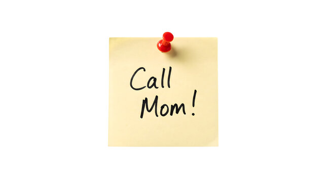 A yellow sticky note with the words Call Mom written on it.