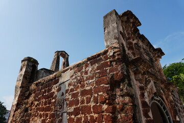 Low Angle Exterior View of Ancient Red Stone Fort Ruins, Portuguese Heritage Malacca © Two Cats Media