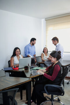 Latin business teamwork with diverse men and women working at office in Mexico Latin America. Portrait of hispanic big group of people employees in a company or workplace
