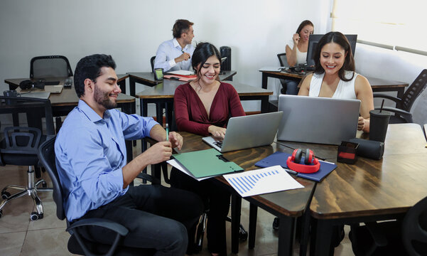 Latin business teamwork with diverse men and women working at office in Mexico Latin America. Portrait of hispanic big group of people employees in a company or workplace
