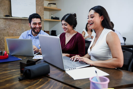 Latin business teamwork with diverse men and women working at office in Mexico Latin America. Portrait of hispanic big group of people employees in a company or workplace