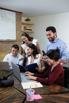 Latin business teamwork with diverse men and women working at office in Mexico Latin America. Portrait of hispanic big group of people employees in a company or workplace