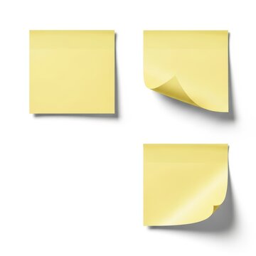 Yellow sticky note with folded corner on paper next to blank one