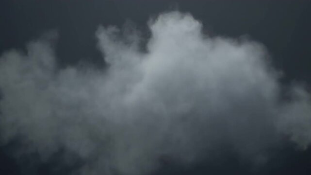 Soft gray smoke drifts naturally across a dark background with subtle density changes and realistic turbulence. Suitable for cinematic overlays, advertising, presentations, websites, and editorial pro