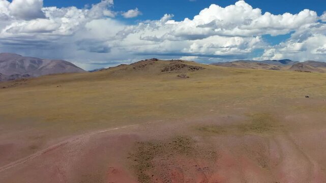 Red clay canyon. Aerial video from drone of Altai mountain landscape in Altai mountains.