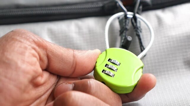 Locking a bag with a combination lock at the airport