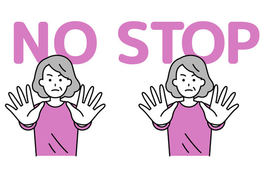 両手を前に出してNO/STOPと言う年配の女性