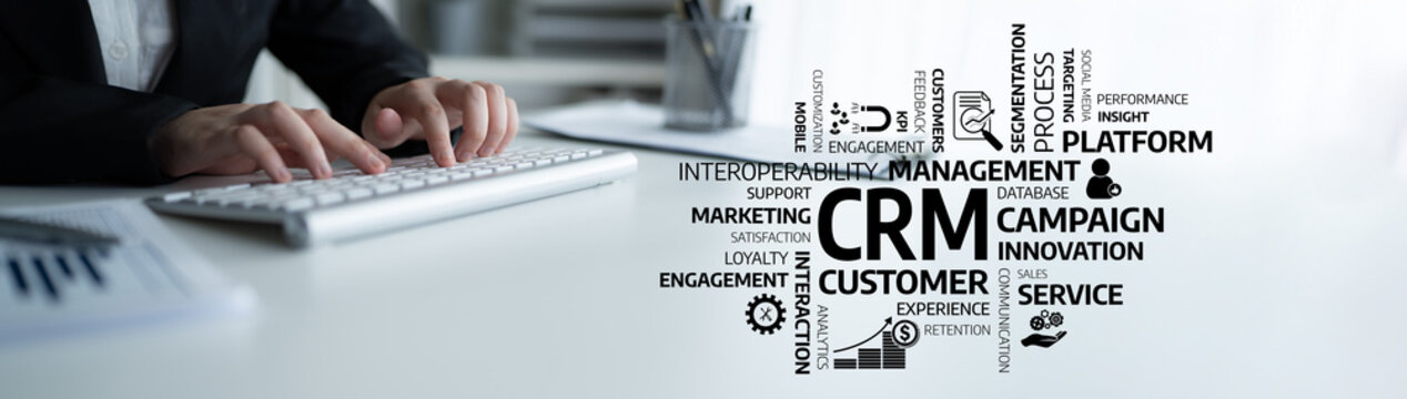 A professional setting featuring hands typing on a keyboard, surrounded by key concepts in CRM, emphasizing strategies for customer engagement and business success. Tessel