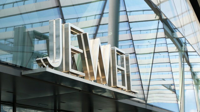 Singapore on 14 April 2026: Jewel Changi Airport's iconic sign displayed beneath its glass geodesic dome structure, showcasing Singapore's famous glass-and-steel architectural entrance. shopping mall