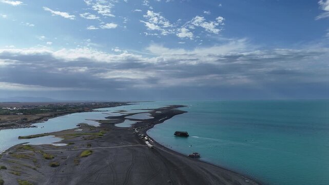 Lake Alakol is a large, endorheic, bitter-salt lake in southeastern Kazakhstan, situated on the border between the Zhetysu and Abai regions.
