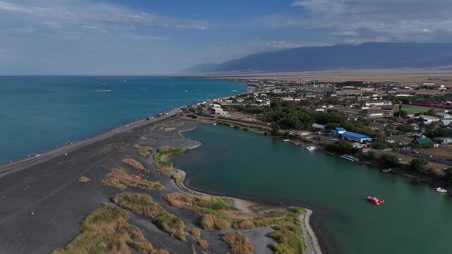 Lake Alakol is a large, endorheic, bitter-salt lake in southeastern Kazakhstan, situated on the border between the Zhetysu and Abai regions.