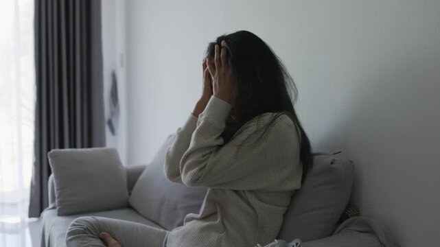 Depressed woman facing emotional hardship and domestic abuse, showing sadness, anxiety, stress and the struggle to find support and recovery.