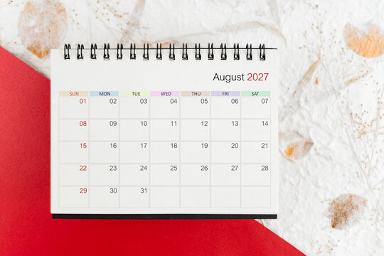 August calendar 2027 on mulberry paper background. 2027 calendar planning appointment meeting concept.