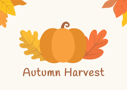 Autumn composition with a pumpkin in the center with oak leaves on sides