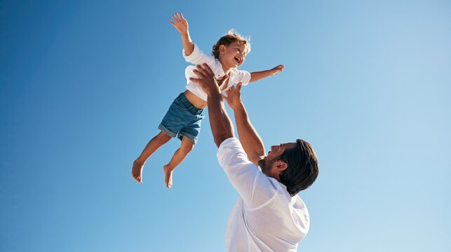 Joyful Family Moment: Father and Child in Nature