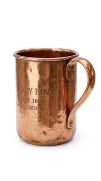 Antique copper measuring mug container with rustic vintage patina on white background