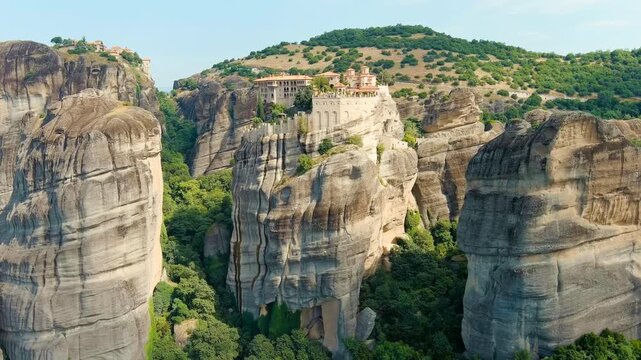Meteora, Kalabaka, Greece. Monastery of Varlaam. Meteora - rocks, up to 600 meters high. There are 6 active Greek Orthodox monasteries listed on the UNESCO list. Drone footage