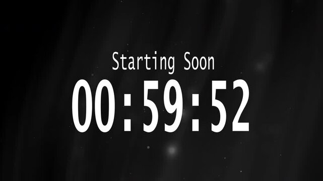 Digital Countdown 1 Hour Timer Screen With Text Starting Soon On Dust Particles Bokeh Background