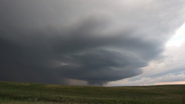 An anticyclonic supercell thunderstorm approaches on the high plains of western Nebraska. Time lapse footage.