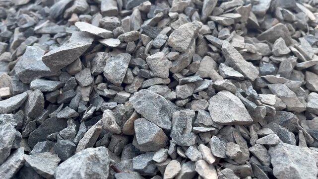 Crushed gravel stones pile at industrial construction site