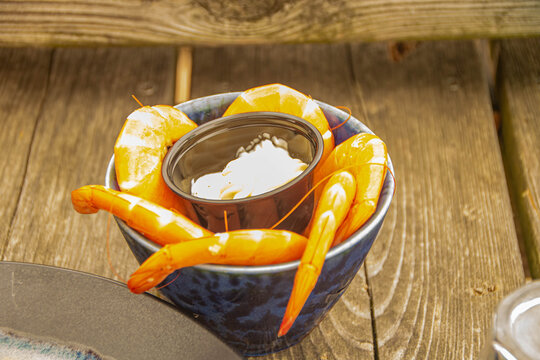 Bowl of Fresh Cooked Shrimps and Mayonnaise on a Wooden Table in Andernos-les-Bains