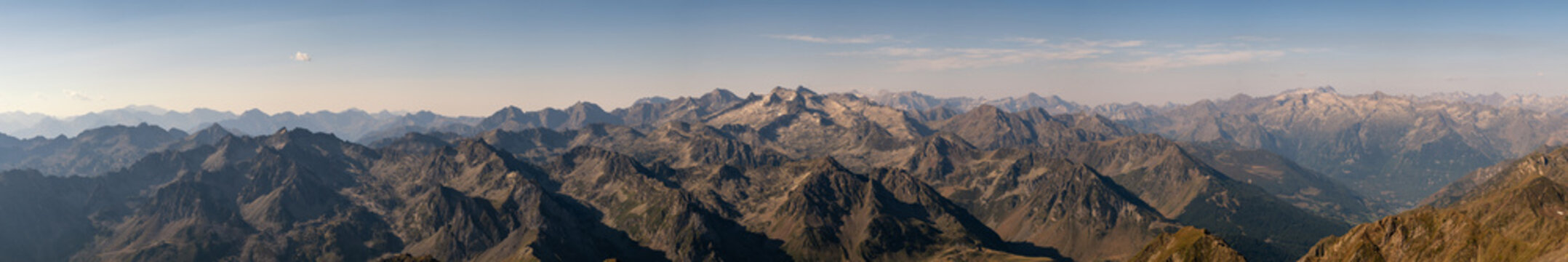 Panoramic view of numerous mountain peaks of the Pyrenees mountains viewed from the 2877 metre high Pic du Midi observatory in France