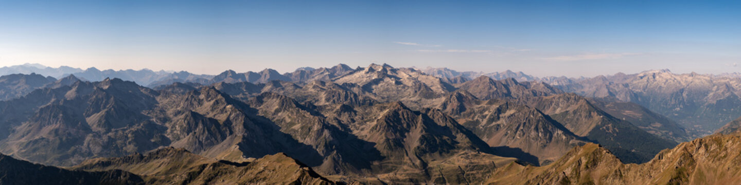 Panoramic view of numerous mountain peaks of the Pyrenees mountains viewed from the 2877 metre high Pic du Midi observatory in France