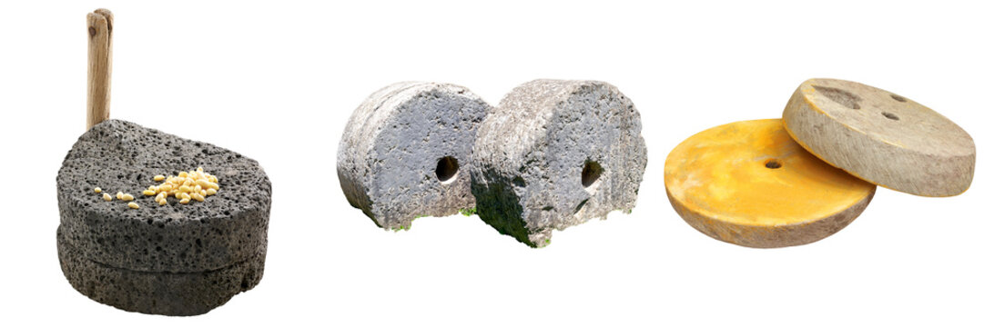 Collection of ancient stone grinding tools and millstones