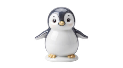 Fototapeta premium Adorable ceramic penguin figurine, cute porcelain bird statue with gold accents, glossy white and gray nursery decor on white background