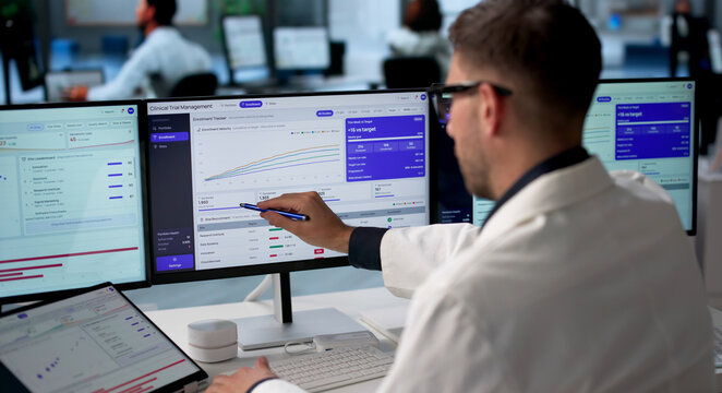 Clinical Trial Manager Reviews Patient Enrollment Data