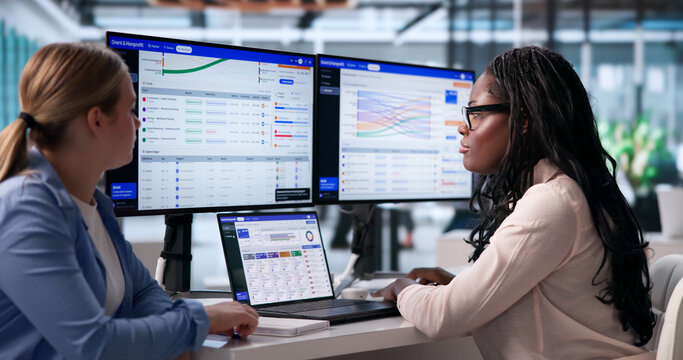 Focused Manager Uses Laptop To Track Grant Funding