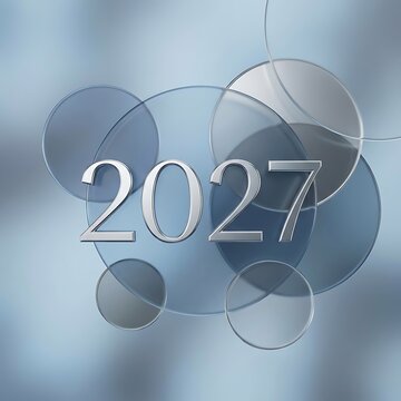 Shiny silver 2027 numbers floating over overlapping transparent blue glass circles background