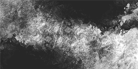 Obraz premium Abstract monochrome texture of turbulent water and white foam creating a dynamic, energetic surface, close-up detail of rushing rapids
