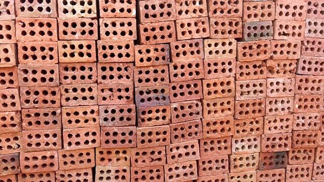 Stacked Red Clay Bricks Pattern For Construction Material Background