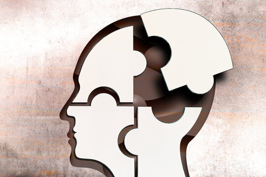 Mental health concept. Human head puzzle pieces.