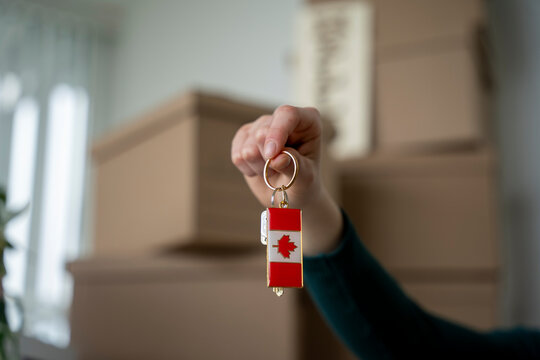 Canada House Keys with Moving Boxes in New Home