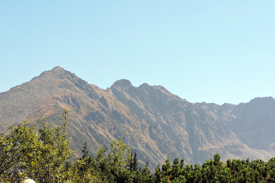 Rocky peaks of Skrajny Granat and Czarne Ściany on Orla Perć mountain ridge, Tatra Mountains in Poland