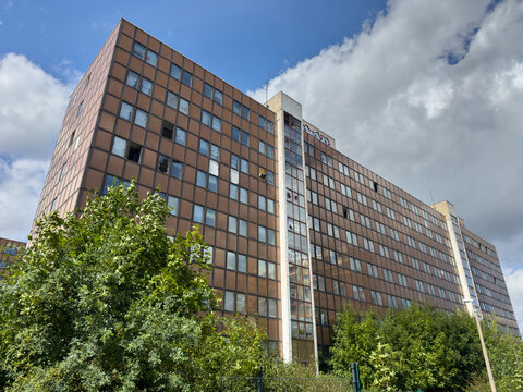 Abandoned Glass-Clad Prefab Building in an East German City