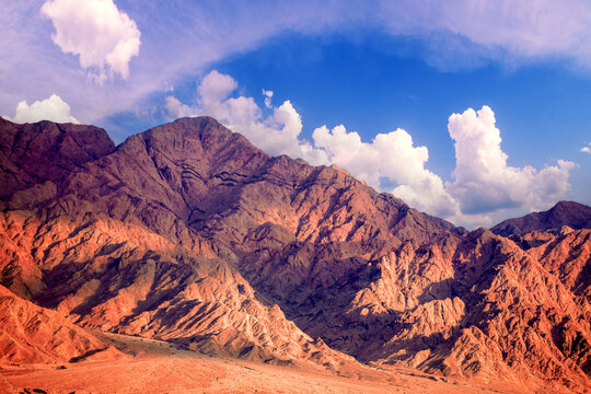 Beautiful dramatic mountain landscape during sunset. Mountain ridge background