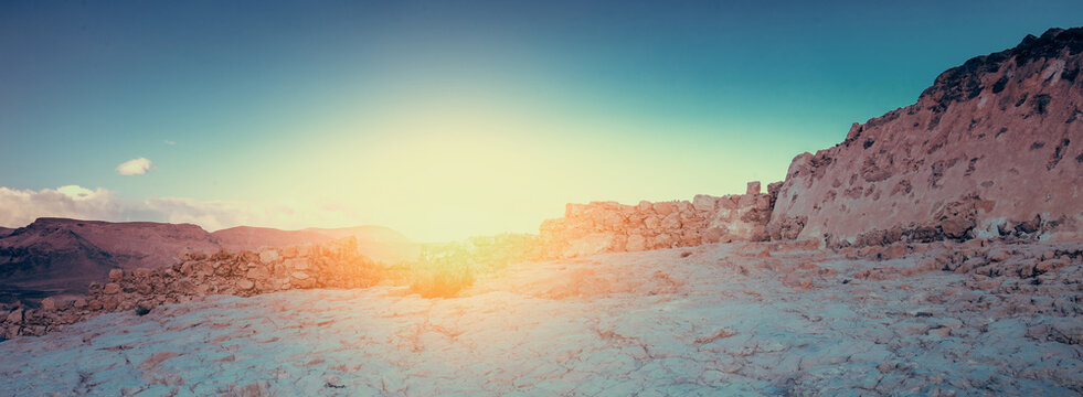 Sunrise over Masada fortress. Ruins of King Herod's palace in the Judaean Desert
