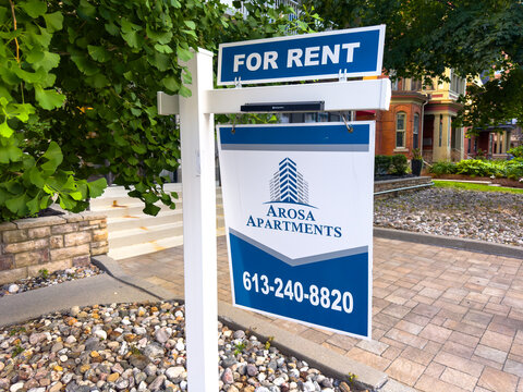 Ottawa, Ontario, Canada. August 21, 2026. Arosa Apartments For Rent sign posted outdoors on post along residential street in Centretown.