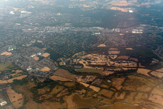 Travel and Places: High Level Aerial View of Woking Town Centre, Hoe Valley, and Surrounding Surrey Countryside in England