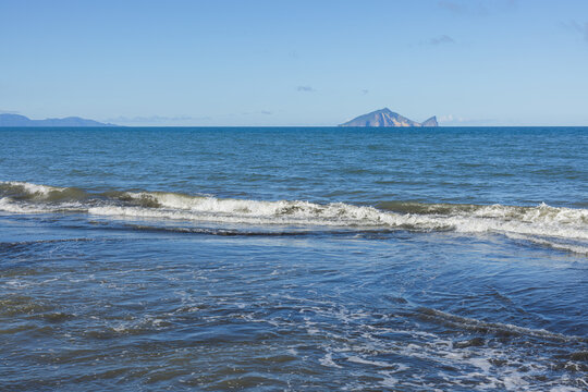 Waves crashing on ocean shore in Taiwan landscape