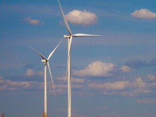 wind turbine on blue sky © Samantha